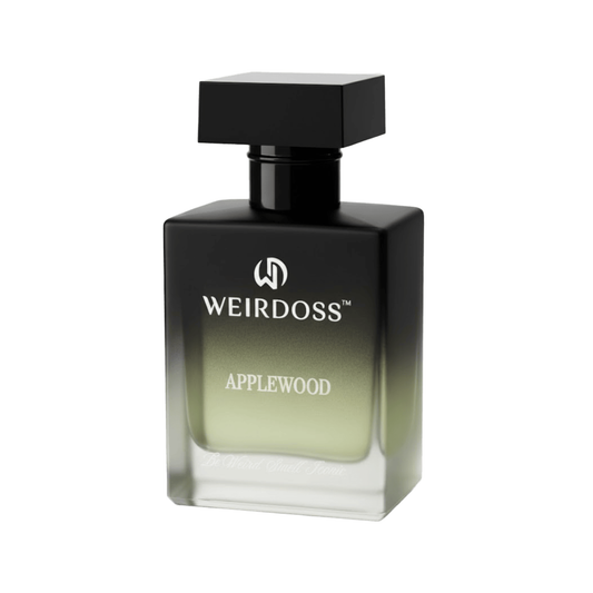 Black and green perfume bottle labeled 'Weirdoss Applewood' on a white background